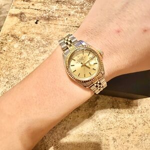 Authentic Date RolexSerial # 6747160Model # 691714k gold & stainless steel